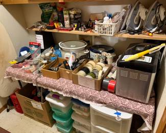 tape, bread maker, crock pots, lightbulbs, storage