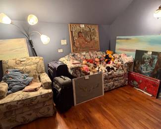 sofa and chair, dolls and art and luggage