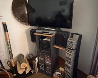 TV, DVD, rain sound maker, logs