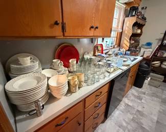 kitchen dishes and glasses and bowls and tools