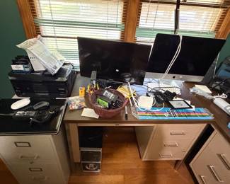 More computer and desks and filing cabinet