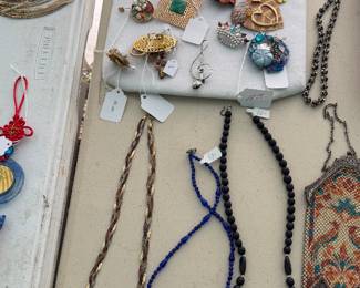 Brooches and necklaces