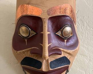 Dale Horne, Native Alaskan Tsimshian carver from Metlakatla on Annette island, Alaska with Sacagawea Golden Dollar Coins/Eyes