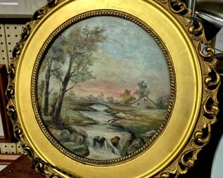 Vintage oil in round gold leaf frames
