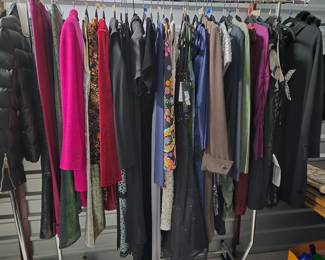 2 racks of designer dresses 
