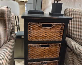 3 wicker basket drawers in small cabinet