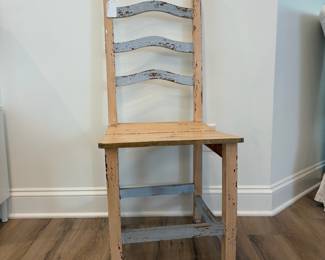 A13 - $30. Primitive Style Ladder-back side chair. Measures 17.5" x 17.75" x 42" tall. Floor to seat is 18.25".