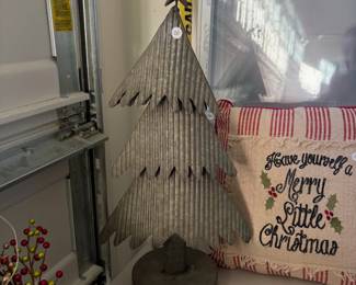 A65 - $20. Tin Christmas Tree. Measures 25.5" tall.