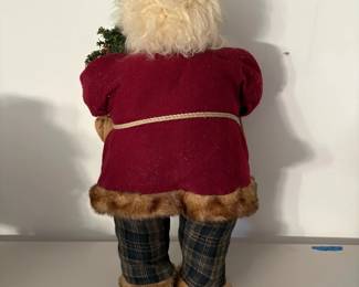 A86 - $25. Decorative Santa. Measures 25" tall.