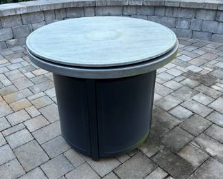A36 - $60. Garden Treasures Propane Fire Pit with Enduro Top Lid.