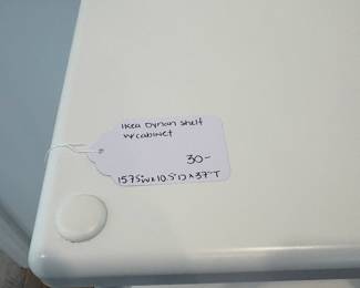 A12 - $30. Ikea Dynan Shelf with Cabinet. Measures 15.75" x 10.5" x 37" tall.