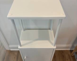A12 - $30. Ikea Dynan Shelf with Cabinet. Measures 15.75" x 10.5" x 37" tall.