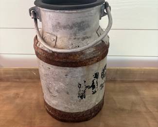A14 - $40. 10L Metal Milk Can / (Milchkanne). Measures 9" across x 14.5" tall.