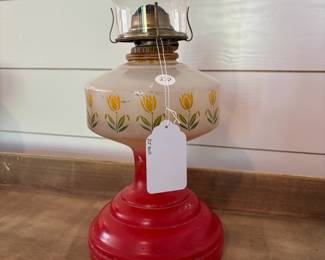 A41 - $20. Oil Lamp with globe. Measures 20" tall.