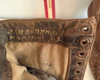 A48 - $20. Antique Lace Up Boots for display.