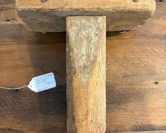 A60 - $50. Primitive One-Legged Milking Stool turned into a wall shelf. Measures 12" x 5.5" x 12" tall.