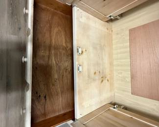 A49 - $100. Solid Wood Armoire with whitewash finish and floral design. Measures 43.75" x 22.25" x 76" tall. Doors slide into the cabinet.