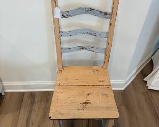 A13 - $30. Primitive Style Ladder-back side chair. Measures 17.5" x 17.75" x 42" tall. Floor to seat is 18.25".