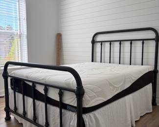 A2 - $550. Wesley Allen Iron Queen Size Bed. FRAME ONLY. Measures 61" wide x 87" long x 58" tall.
