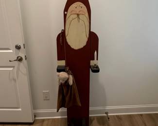 A83 - $40. Wooden Santa. Measures 18" wide x 67" tall.
