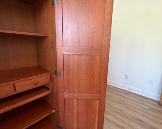 A7 - $400. Arhaus Furniture Shaker Style Cherry Wood Armoire. Measures 47.5" x 25.25" x 68" tall. The outside is in very good condition - the inside shows the most wear. Beautiful piece - not oversized!