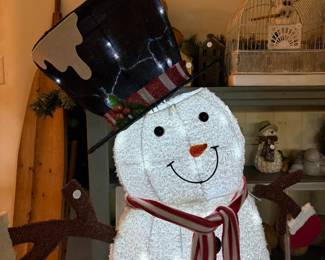 A67 - $30. Decorative Outdoor Snowman. Measures 45" x 53" assembled.