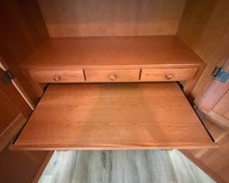 A7 - $400. Arhaus Furniture Shaker Style Cherry Wood Armoire. Measures 47.5" x 25.25" x 68" tall. The outside is in very good condition - the inside shows the most wear. Beautiful piece - not oversized!