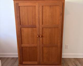 A7 - $400. Arhaus Furniture Shaker Style Cherry Wood Armoire. Measures 47.5" x 25.25" x 68" tall. The outside is in very good condition - the inside shows the most wear. Beautiful piece - not oversized!