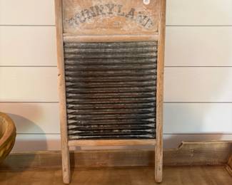 A57 - $25. Sunnyland Antique Washboard. Measures 12.5" x 24" tall.
