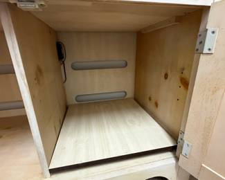 A49 - $100. Solid Wood Armoire with whitewash finish and floral design. Measures 43.75" x 22.25" x 76" tall. Doors slide into the cabinet.