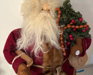 A86 - $25. Decorative Santa. Measures 25" tall.