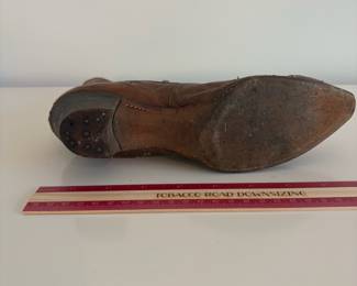 A48 - $20. Antique Lace Up Boots for display.