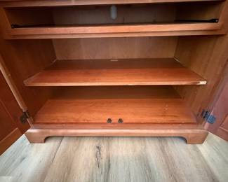 A7 - $400. Arhaus Furniture Shaker Style Cherry Wood Armoire. Measures 47.5" x 25.25" x 68" tall. The outside is in very good condition - the inside shows the most wear. Beautiful piece - not oversized!