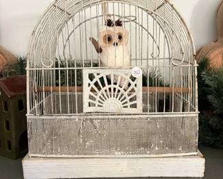 A81 - $30. Decorative Bird Cage. Measures 14" x 9.5" x 14.75" tall.