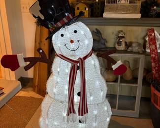 A67 - $30. Decorative Outdoor Snowman. Measures 45" x 53" assembled.
