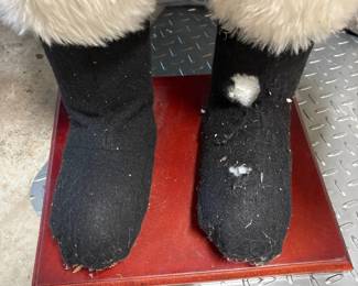 A68 - $75. Large Decorative Santa. Measures 60.5" tall. Has small hole in the top of his boot.