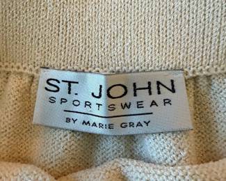 A97 - $45. St. John Sportswear by Marie Gray. Knit Skirt. Size 8. 1 minor stain noted.