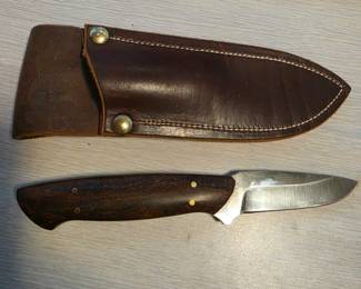 Yarborough fixed-blade hunting knife, the wood handle construction, and the leather sheath