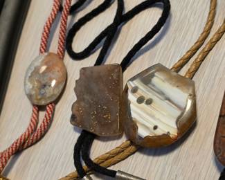 bolo ties, one in the shape of Arizona