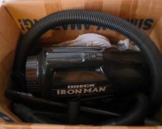 Oreck Ironman handheld vacuum with hose and attachments