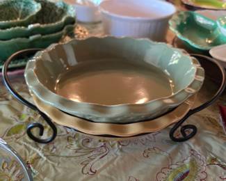 Pale green scalloped serving bowl with metal stand