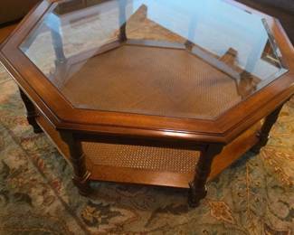 traditional hexagonal glass-top wooden coffee table