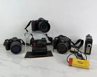 Lot 8859 Vintage Cameras Nikon DSLR Polaroid Land Camera CineKodak Eight25 8mm