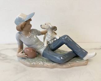 Lot 8913 Nao by Lladro Boy with Dog Porcelain Figurine