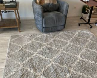 Gray Swivel Rocking Recliner, Blanket, And Rug