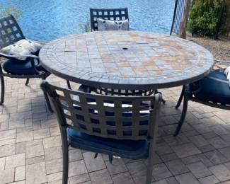 Large Round Stone Top Outdoor Table And Four Chairs