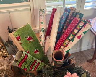Collection of Assorted Christmas Wrapping Paper Rolls