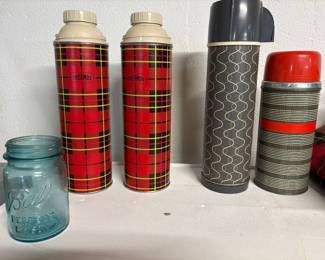 Vintage Thermos brand thermos' and ball jars are available
