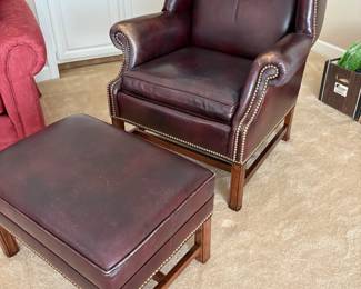 Beautiful leather arm chair and matching ottoman