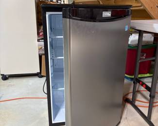 Miniature fridge. Perfect for a dorm room, office or butler panty